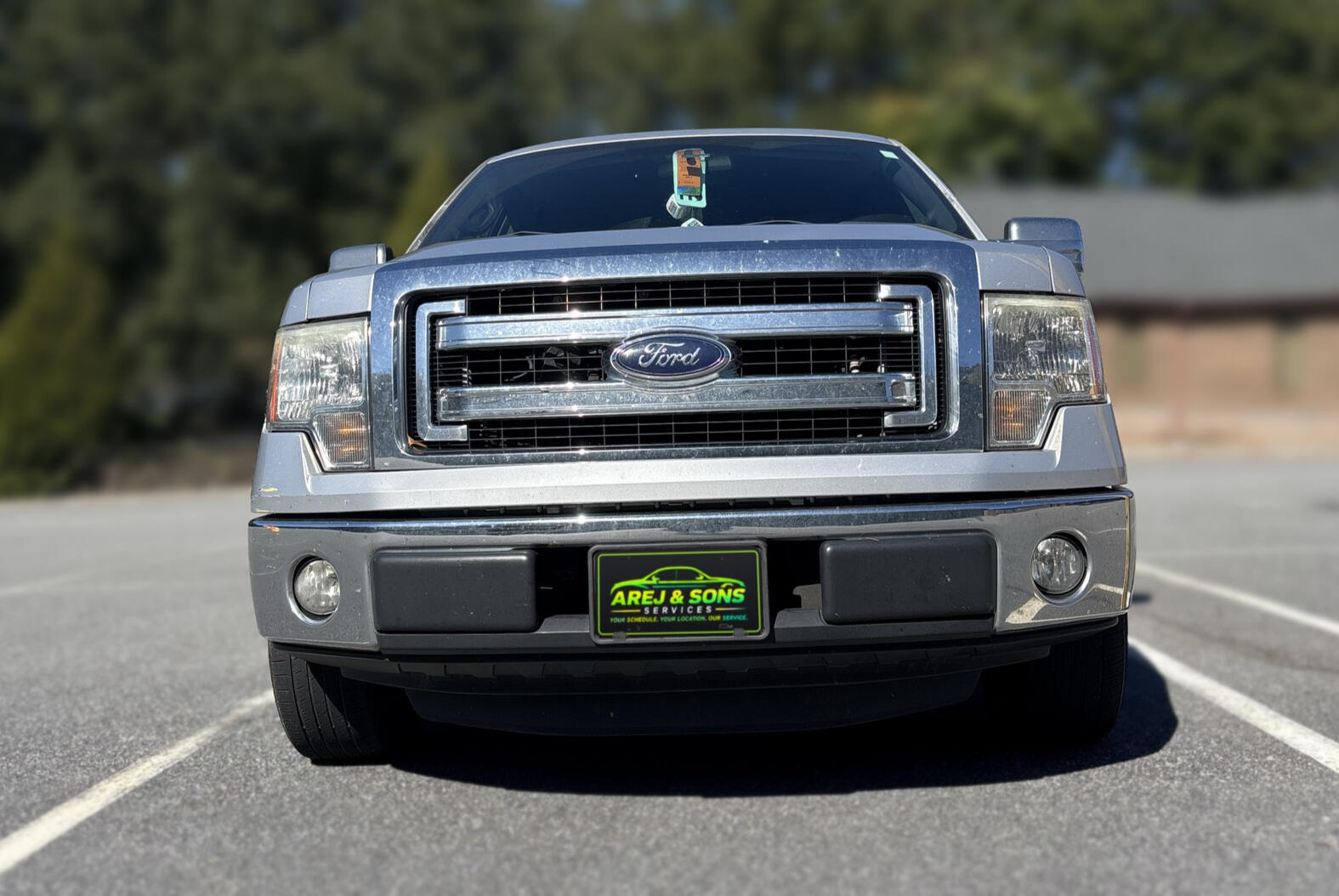 AREJ & Sons Services silver Ford F-150